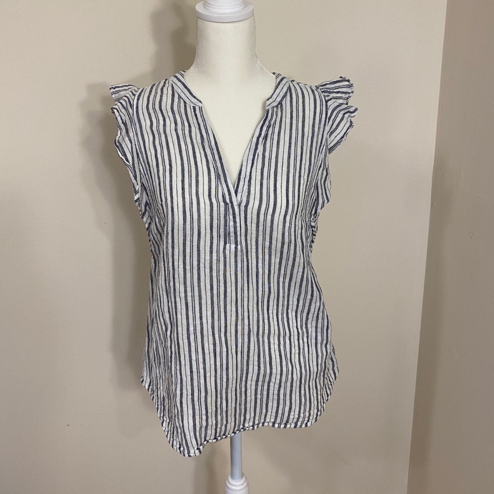 Ruffled sleeveless blouse